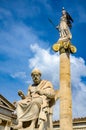 Statues of Plato and the goddess Athena at the entrance of the Academy of Athens