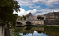 Statues on the Ponte Vittorio Emmanuele II with the Saint Peters Basilica in the Background - Rome, Italy