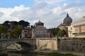 Statues on the Ponte Vittorio Emmanuele II with the Saint Peters Basilica in the Background - Rome, Italy