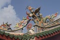 Statues on the roof of a chinese temple in the streets of Kuching of Malaysia