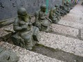 Statues on the Stairs of a Temple in Japan Royalty Free Stock Photo