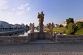 Statues on stone bridge