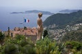 Eze, France - June 17, 2021 - the exotic garden of Eze with statues of resplendent women