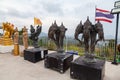 Statues of the three-headed elephant Airavata, the king of all elephants in Hinduism, a mythological creature. Big buddha statue