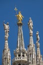 Statues on top of roof cathedral in Milan Royalty Free Stock Photo