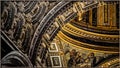 Statues on the top of Saint The interior of Saint Peter Basilica in Rome, Italy