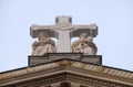 The Statues Of The Two Angels Under The Cross On The Facade Of Saint Augustine Church In Paris
