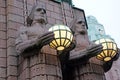 Statues at the walls of central train station. Helsinki, Finland