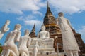 Statues of white monks praying with Buddha. at Wat Yai Chai Mongkhon a Buddhist temple in Ayutthaya, Thailand Royalty Free Stock Photo