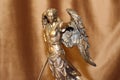 Statuette of the Archangel Michael on a velour background