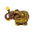 Statuette of brown elephant with yellow sapphire isolated on a white background Royalty Free Stock Photo