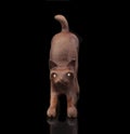 Statuette of a cat from a brown sandalwood Royalty Free Stock Photo