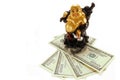 Statuette of the Chinese god of wealth on money Royalty Free Stock Photo