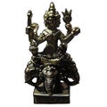 Statuette Four Face Buddha many-armed, sitting on elephants Royalty Free Stock Photo