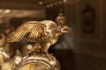 Statuette of a golden double-headed eagle with a crown