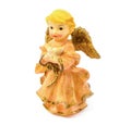 Statuette of porcelain angel with pigeon isolated on white background