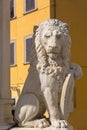 Status of Marzocco heraldic lion with shield in Piazza di Santa