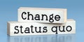 Status quo, change - words on wooden blocks