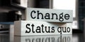 Status quo, change - words on wooden blocks