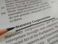 statutory corporations words displaying on book article underlined text pattern