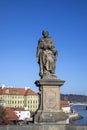 Staue of saint jude Thaddeus on the Charles Bridge, a famous historic bridge that crosses the Vltava river in Prague