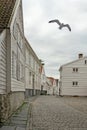 Stavanger street with traditional wooden white houses, Norway Royalty Free Stock Photo