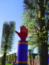 Artistic column and hand in Dutch fishing village