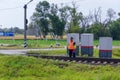 Rail workers want to go along the tracks and repair the rails. Repair work on the railway Royalty Free Stock Photo