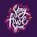 Stay awesome phrase. Hand drawn vector lettering phrase. Isolated on violet background.