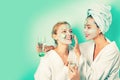 Stay beautiful. Skin care for all ages. Women having fun cucumber skin mask. Relax concept. Beauty begins from inside Royalty Free Stock Photo
