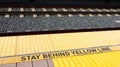 Stay Behind Yellow Line Warning Sign on platform at Train Station Royalty Free Stock Photo