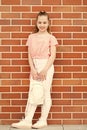 Stay casual. Little cute child smiling in casual style. Happy small girl in casual and comfy outfit. Casual and