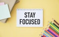 STAY FOCUSED text on notebook and other Royalty Free Stock Photo