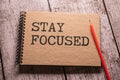 Stay focused on your goals. text on white paper on gray background. Royalty Free Stock Photo