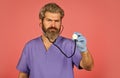 Stay healthy. Doctor with stethoscope at hospital. Bearded man doctor. Medical treatment. Prescribed by doctor. Health Royalty Free Stock Photo