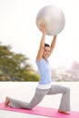 Stay healthy and live longer. Full length portrait of a young woman doing yoga outdoors. Royalty Free Stock Photo