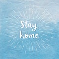 Stay home hand lettering with sunburst lines on blue crumpled paper