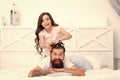 Stay home and have fun. Family leisure concept. Girl making hairdo for dad. Quarantine with children. Happy family Royalty Free Stock Photo