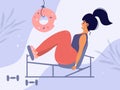 Young woman on exercise machine doing workout and looking at donut Royalty Free Stock Photo