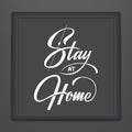 Stay At Home lettering in dark frame. Vector hand drawn typography design. Stop Coronavirus motivational quote. Pandemic