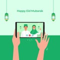 Stay Home online video call with family for Eid Mubarak Islamic festival celebration during covid 19 pandemic. Hand holding