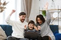 Stay home. Portrait of smiling father, mother and son using laptop for a online meeting, video call, video conference Royalty Free Stock Photo