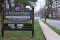 Stay home save lives sign in small town America