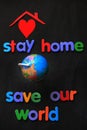 `Stay home, save our world` slogan due to Coronavirus pandemic outbreak around the world. Royalty Free Stock Photo