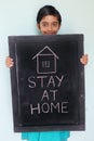 Stay at home concept written on blackboard. Royalty Free Stock Photo