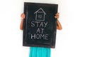 Stay at home concept written on blackboard. Royalty Free Stock Photo