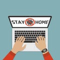 Stay home slogan with stop coronavirus sign on laptop screen. Protection campaign or measure from coronavirus, COVID--19 Royalty Free Stock Photo