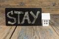 Stay at home text on the chalkboard