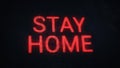 Stay at home warning banner. Red pixel text on old dusty screen