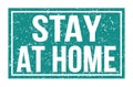 STAY AT HOME, words on blue rectangle stamp sign
